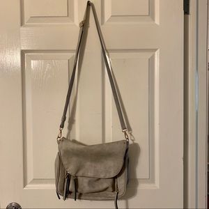 Grey satchel handbag with tassel zip pulls